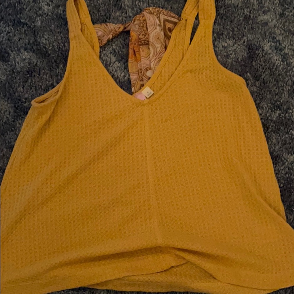 cute shirt with tie in the back